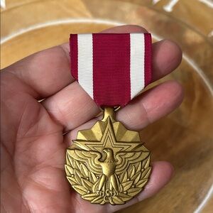 United States Meritorious Service Medal Bronze with crimson & white ribbon